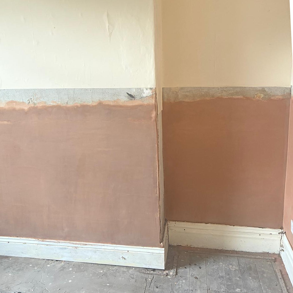 Chimney breast after damp treatment
